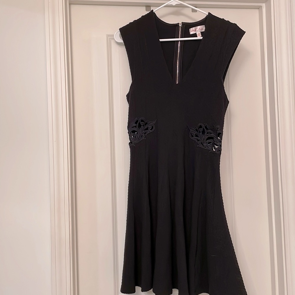 Black night out dress with sides floral design exposed dress.